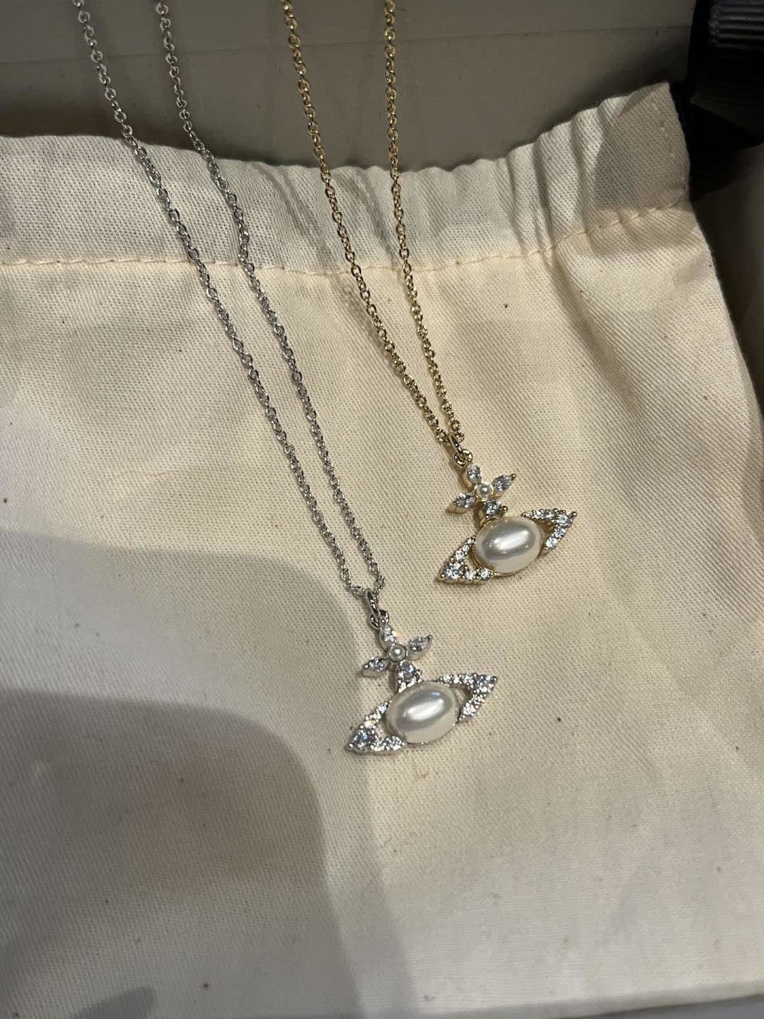 Vivienne Westwood Elegant Pearl and Diamond Pendant Necklace